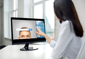 Image showing close up of woman with internet search computer