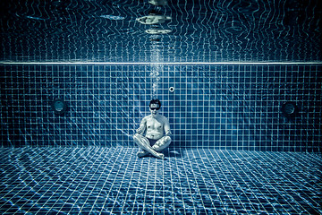 Image showing Persons lies under water in a swimming pool