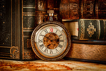 Image showing Old Books and Vintage pocket watch