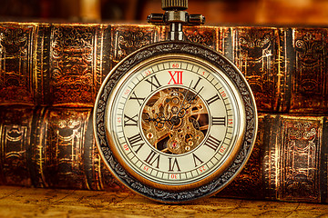 Image showing Old Books and Vintage pocket watch