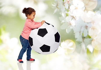 Image showing happy mulatto little baby girl playing with ball