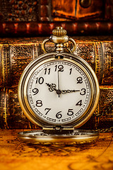 Image showing Old Books and Vintage pocket watch