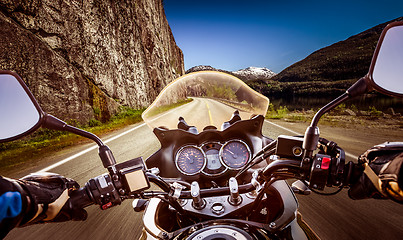 Image showing Biker First-person view, mountain serpentine.