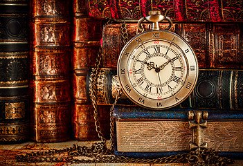 Image showing Old Books and Vintage pocket watch