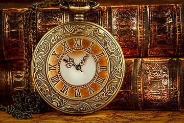 Image showing Old Books and Vintage pocket watch