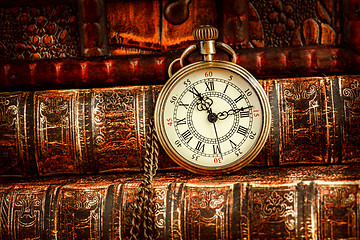 Image showing Old Books and Vintage pocket watch