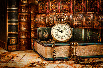 Image showing Old Books and Vintage pocket watch