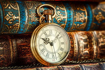 Image showing Old Books and Vintage pocket watch