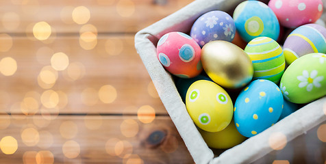 Image showing close up of colored easter eggs in basket