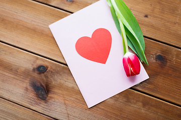 Image showing close up of flowers and greeting card with heart