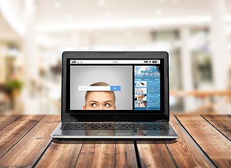 Image showing laptop computer with internet search bar on screen