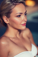 Image showing close up of woman in swimsuit at swimming pool