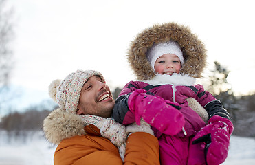 Image showing happy family in winter clothes outdoors