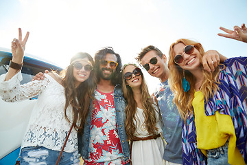 Image showing hippie friends over minivan car showing peace sign