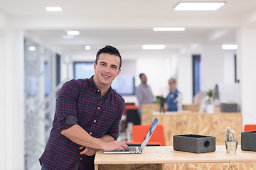 Image showing startup business, young  man portrait at modern office