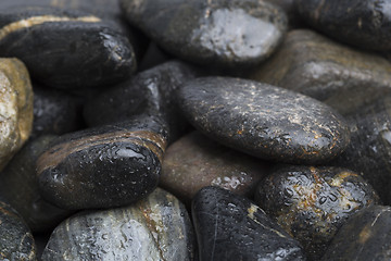 Image showing Dark and wet stones for background