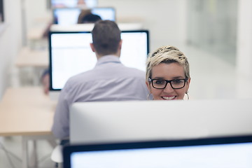 Image showing startup business, woman  working on desktop computer