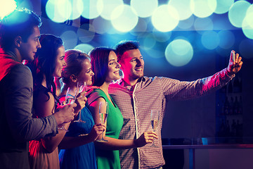 Image showing friends with glasses and smartphone in club