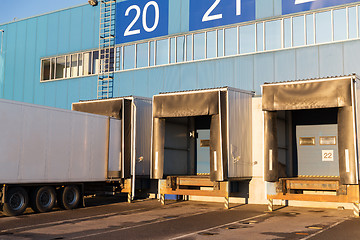 Image showing warehouse gates and truck loading