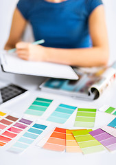 Image showing woman working with color samples for selection