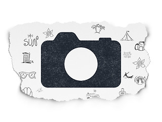 Image showing Tourism concept: Photo Camera on Torn Paper background