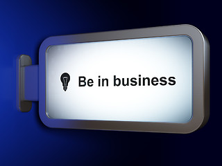 Image showing Business concept: Be in business and Light Bulb on billboard background