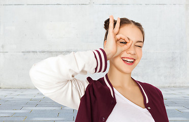 Image showing happy teenage girl making face and having fun