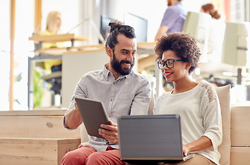 Image showing creative team with laptop and tablet pc in office