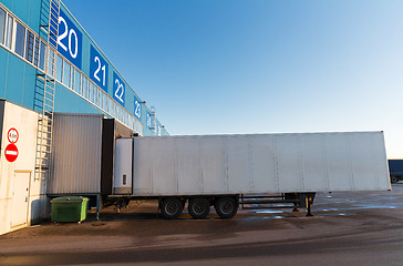 Image showing warehouse gate and truck loading