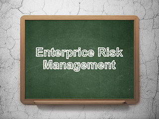 Image showing Finance concept: Enterprice Risk Management on chalkboard background