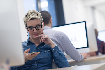 Image showing startup business, woman  working on desktop computer