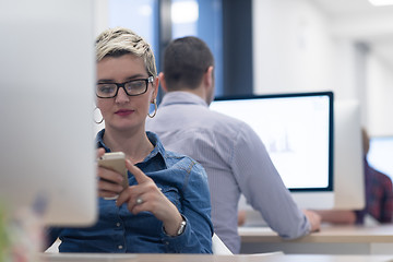 Image showing startup business, woman  working on desktop computer