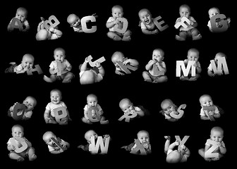 Image showing Baby posing alphabet letters