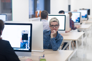 Image showing startup business, woman  working on desktop computer