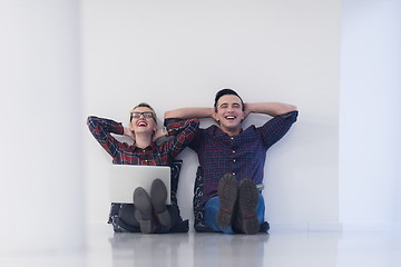 Image showing startup business, couple working on laptop computer at office