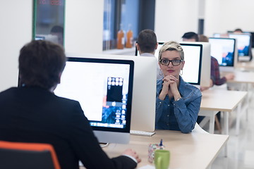 Image showing startup business, woman  working on desktop computer