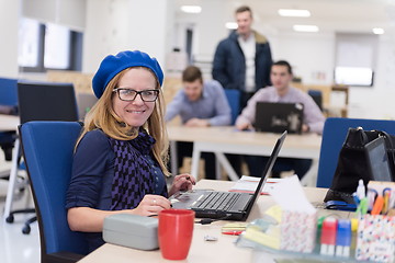 Image showing startup business, woman  working on laptop