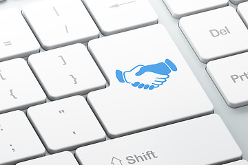 Image showing Business concept: Handshake on computer keyboard background