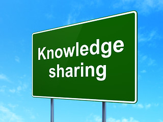 Image showing Learning concept: Knowledge Sharing on road sign background