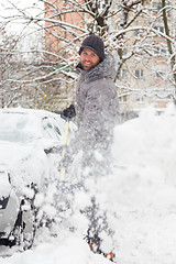 Image showing Man shoveling snow in winter.