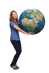 Image showing Woman in full length holding earth globe