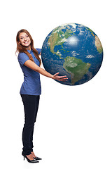 Image showing Woman in full length holding earth globe