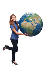 Image showing Woman in full length holding earth globe