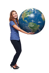 Image showing Woman in full length holding earth globe