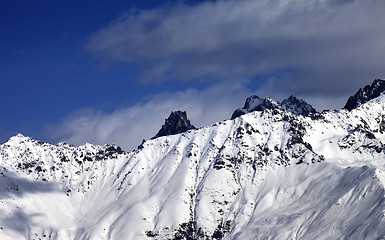 Image showing Snowy avalanches mountainside at sunny day