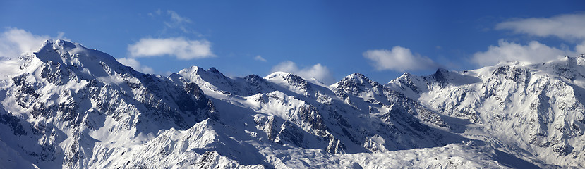 Image showing Panoramic view on snowy mountains in sunny day