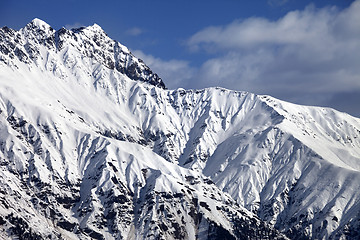 Image showing Snowy sunlight mountains at nice day