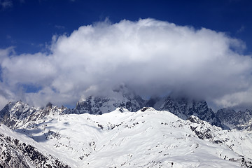 Image showing Mount Ushba in clouds at winter