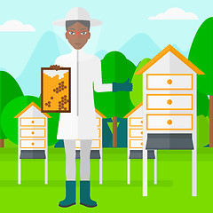 Image showing Bee-keeper at apiary.