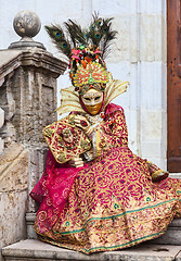 Image showing Disguised Person Sitting on the Steps